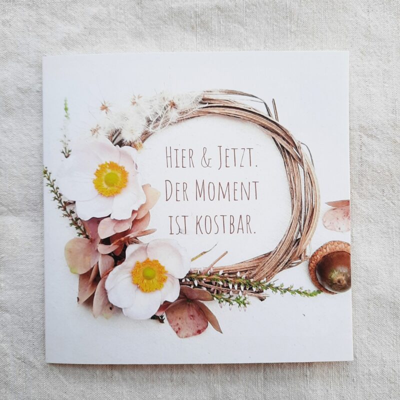 Blumenkranz mit Spruch